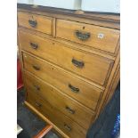 A large Satin walnut chest of drawers