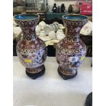 A pair of Cloisonne vase on stands