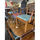 A regency style table and chairs