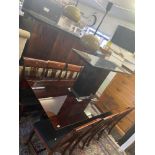 A designer flame Mahogany dining room suite; table, eight chairs,