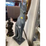 A tall cat figure