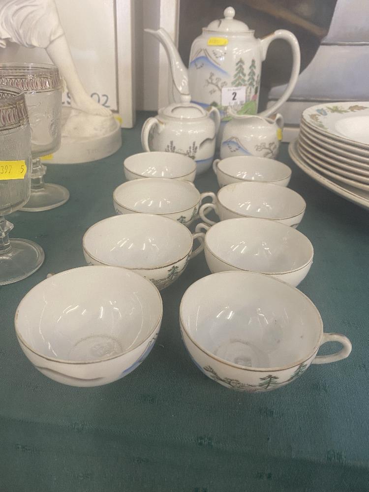 A Japanese egg shell china part tea service