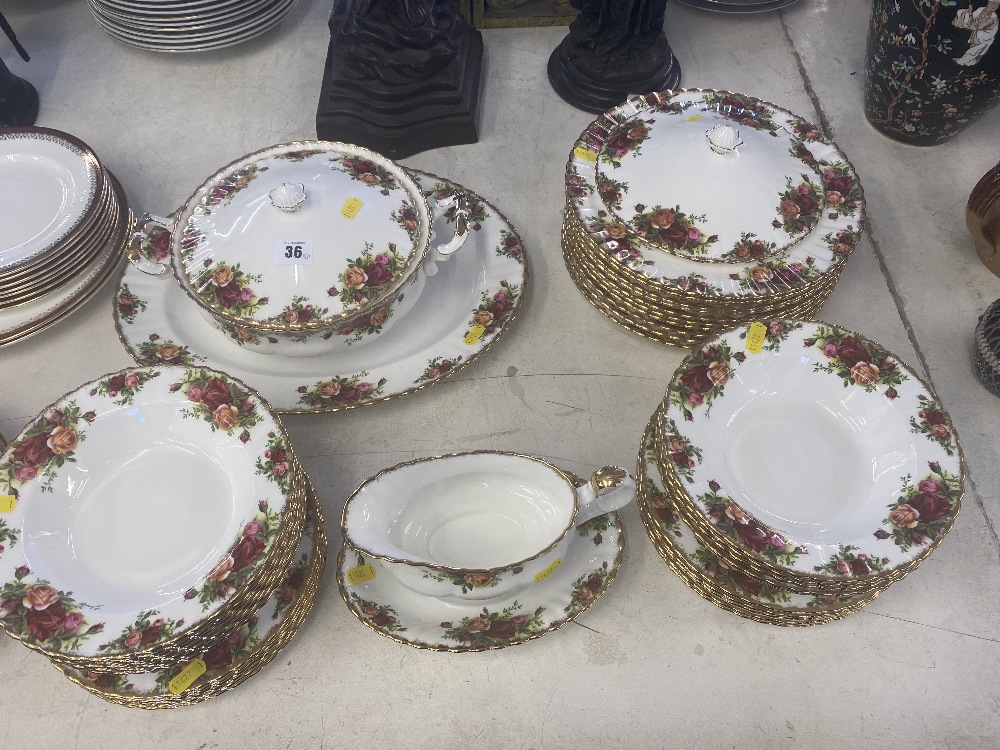 Thirty-seven pieces Royal Albert country roses, plates, bowls etc.