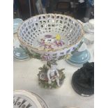 A Meissen centre piece, floral and Putties, a.