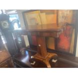 A Mahogany swivel top tea table