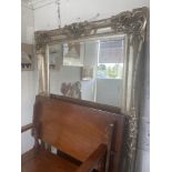 A large decorative Silver gilt mirror