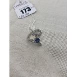 An 18ct White Gold, Sapphire and Diamond crossover ring,