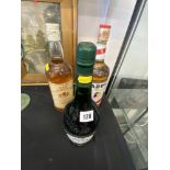 A large bottle Paddy Irish Whisky,