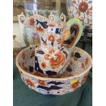 A decorative jug and bowl set