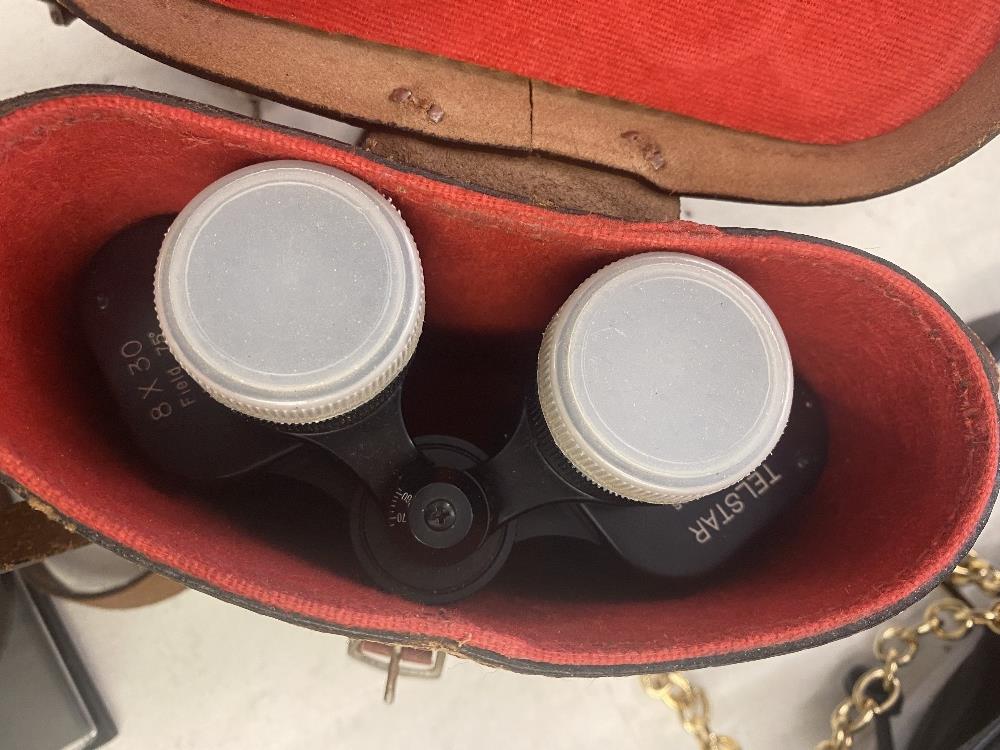 A pair of binoculars,