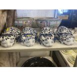 Four blue and white porcelain Cats