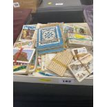 Two boxes of cigarette cards