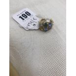 An hallmarked 18ct Gold multi gem set ring,