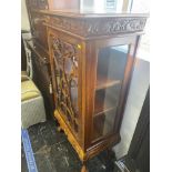 A mahogany display cabinet