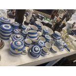 A large collection of Cornish ware and two large jelly moulds