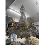 A brass and glass chandelier,