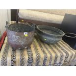 A large copper cauldron and a copper pot