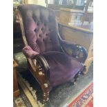 A 19th century upholstered armchair,