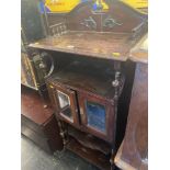 An Edwardian two door cabinet