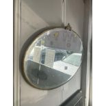 An Oval wall mirror