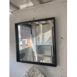 A Black framed mirror (brand new) 65cm x65 cms