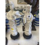A pair of Chinese blanc de chine figures, 1 a.