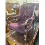 A 19th century upholstered armchair,