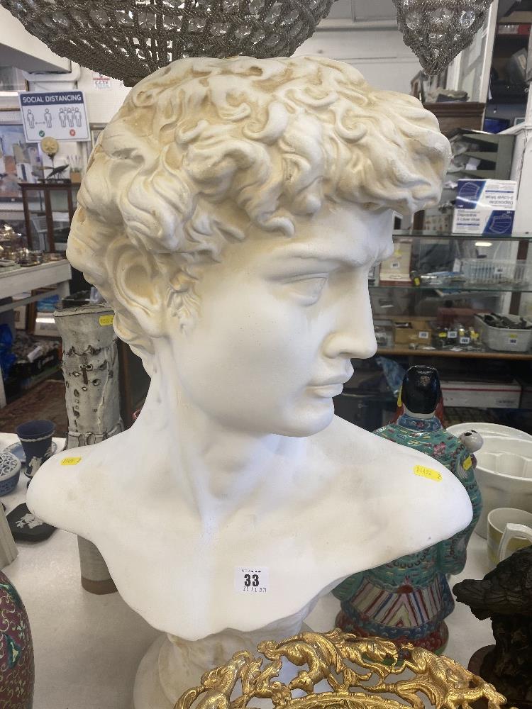 A bust of a young man