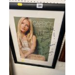 A Caprice signed photograph