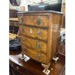 A Walnut chest of four drawers