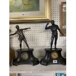 Two Spelter figural mantle clocks