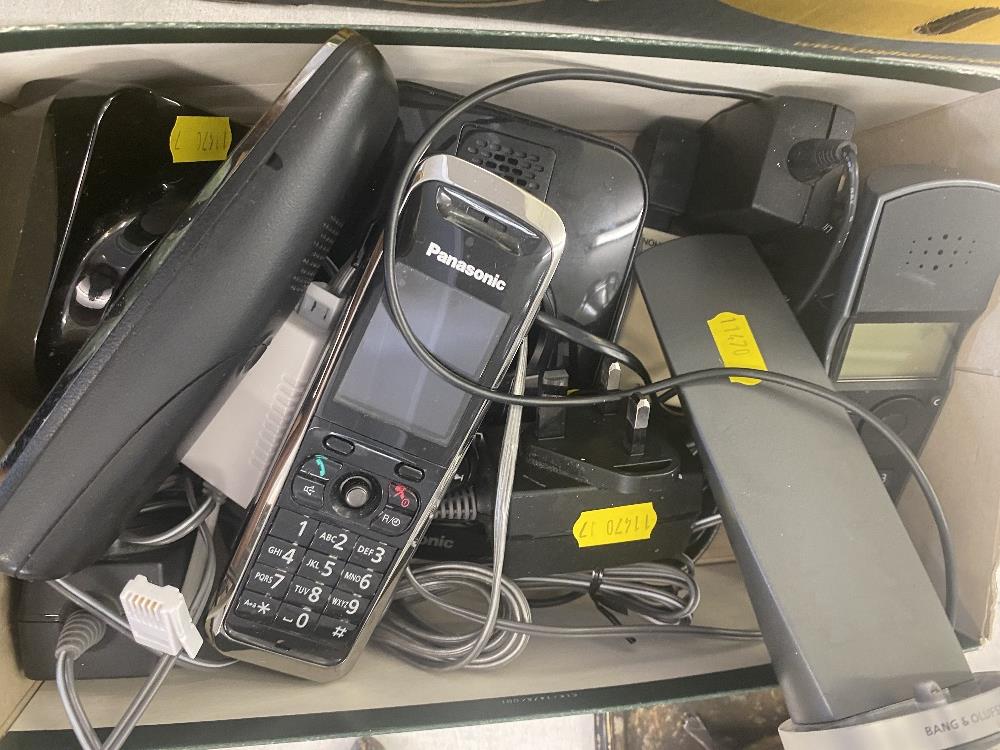 Two Panasonic and one Bang and Olufsen phone