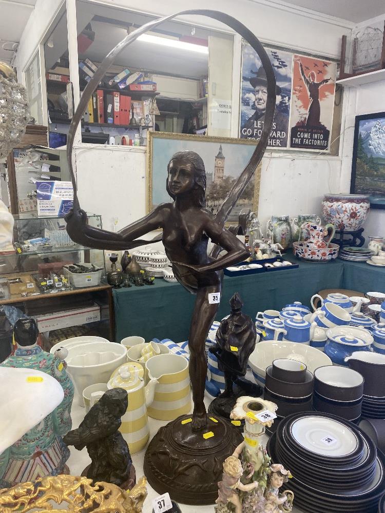 A Bronze ribbon lady