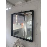 A Black framed mirror (brand new) 65cm x65 cms