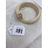 A Boars tooth bangle,