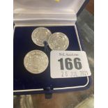 Three Silver German buttons in box