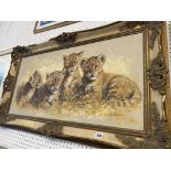 A gilt framed oil on canvas, Lion cubs,