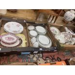 A large qty of assorted china plates,