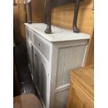 A Pine two door/ two drawer kitchen cabinet