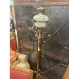 A copper and brass telescopic standing oil lamp