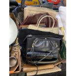 A collection of designer handbags etc.