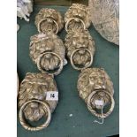 Six silvered Lions head door knockers