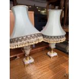 A pair of onyx lamps