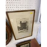 A framed and glazed etching,