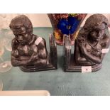 A pair of Bronze and marble bookends