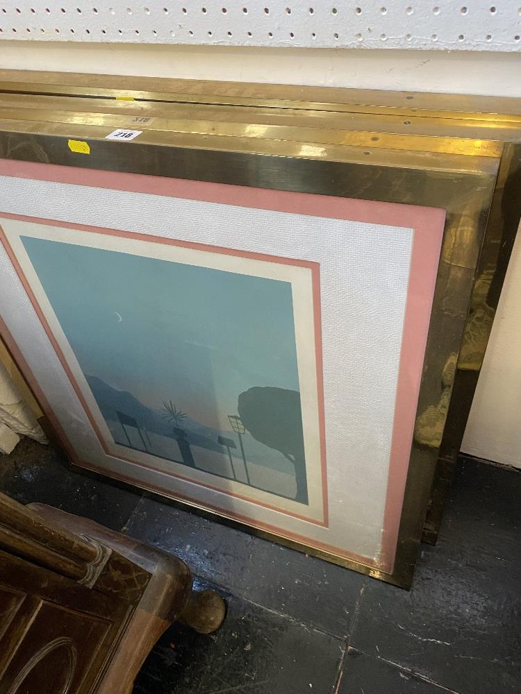 A set of three limited edition heavy brass framed prints,