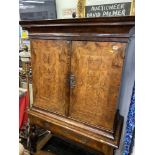 An 18th century Walnut Abanant cabinet on stand