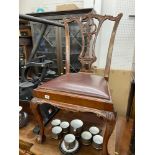 A set of four Chippendale style chairs