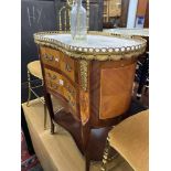 A marble top gilt metal mounted three drawer chest a.