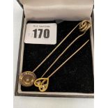 Three 9ct gold tie pins,